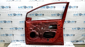 The front right door of a Toyota Prius 50 Prime 17-18 red 3T7 has dents and dings.