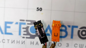 The steering wheel cable with the steering angle sensor for a Toyota Prius V 12-16 has frayed wires.