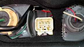 Left headlight of a 2015-2017 Toyota Prius V, cracks in the glass