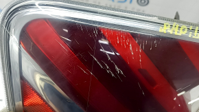 Left headlight of a 2015-2017 Toyota Prius V, cracks in the glass