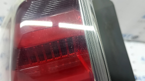 Left headlight of a 2015-2017 Toyota Prius V, cracks in the glass