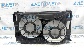 The bare radiator shroud diffuser of a Toyota Prius V 12-17 is broken.