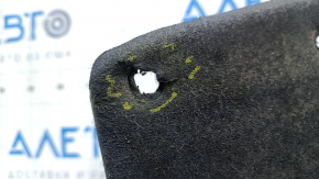 The rear left fender liner of a Toyota Prius 50 Prime 17-22 is torn.