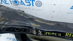The rear subframe of a Toyota Prius 50 Prime 17-22 FWD is rusty.