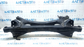 The rear subframe of a Toyota Prius 50 Prime 17-22 FWD is rusty.