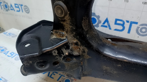 The rear subframe of a Toyota Prius 50 Prime 17-22 FWD is rusty.