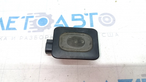 The internal trunk lid closing button on a Lincoln MKZ 13-14 has a worn-out icon.