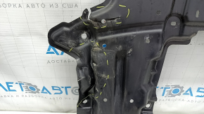 Mitsubishi Outlander 22-25 rear engine guard is dented and torn.