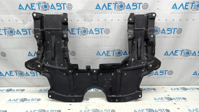 Mitsubishi Outlander 22-25 rear engine guard is dented and torn.