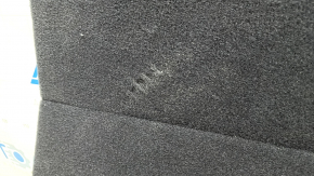The rear trunk floor of the Audi Q5 80A 18 is gray, dented