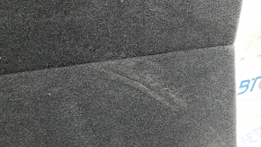 The rear trunk floor of the Audi Q5 80A 18 is gray, dented
