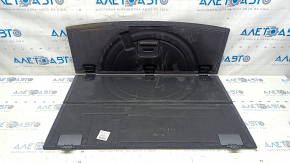The rear trunk floor of the Audi Q5 80A 18 is gray, dented