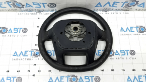 The steering wheel is bare, Toyota Prius V 12-17, black rubber, worn, needs cleaning, scrolls.