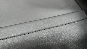 Upper passenger seat trim for a 19-21 VW Jetta, black leather, scratches