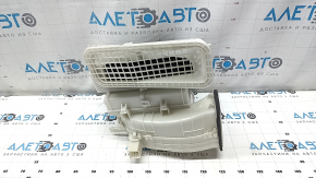 The bare heater housing and ventilation of the Mitsubishi Outlander 22-25