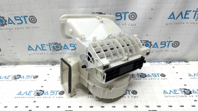 The bare heater housing and ventilation of the Mitsubishi Outlander 22-25
