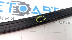 The rear left door seal of a Mitsubishi Outlander 22-25 has torn fasteners.