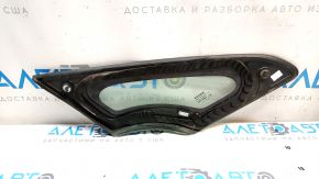 The front left window glass is blind and the seal is torn on a Nissan Leaf 13-17.