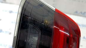 Left BMW 3 G20 22-25 trunk lid interior light, debris under the glass