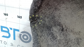The rear engine guard on a Ford Escape MK3 13-19 is torn.