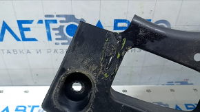 The right trunk bottom protection of the Ford Edge 15-23 AWD is dented and torn.