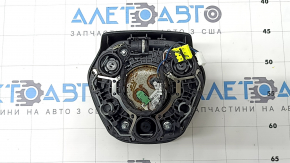The steering wheel airbag for the driver's side of a BMW 3 G20 19-24 is black, with a rusty squib and scratches.