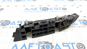 The front bumper mount on the left fender of a Hyundai Elantra AD 19-20 has a broken latch.