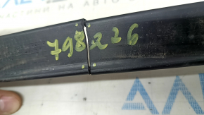 The rear bumper bracket, center, is broken on a Ford Mustang mk6 18-23.
