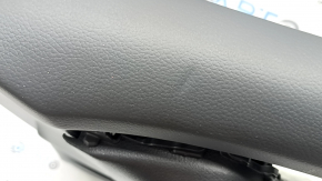 Black front right door panel for a 17-20 Nissan Rogue, black leather armrest with trim, dents