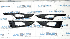 A set of door panel trims for the Nissan Rogue 16-20 in carbon fiber, gloss finish.