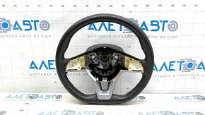 The steering wheel is naked, leather, black, and heated. Nissan Rogue 19-20