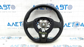 The steering wheel is naked, leather, black, and heated. Nissan Rogue 19-20