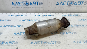 The Lexus RX450h 16-22 catalytic converter is sawed off and rusty.