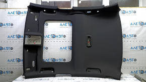 The headliner of the Audi A3 8V 15-16 4d is black, under the sunroof, dented, torn.