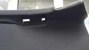 The headliner of the Audi A3 8V 15-16 4d is black, under the sunroof, dented, torn.