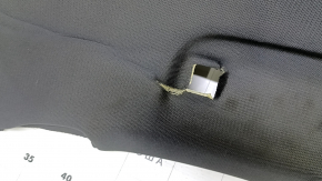 The headliner of the Audi A3 8V 15-16 4d is black, under the sunroof, dented, torn.