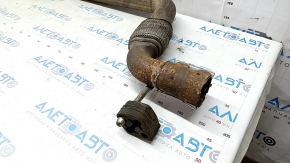 The exhaust pipe with the catalytic converter of the Ford Mustang mk6 18-23 2.3T is rusty, the mesh is torn.
