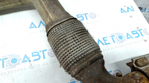 The exhaust pipe with the catalytic converter of the Ford Mustang mk6 18-23 2.3T is rusty, the mesh is torn.