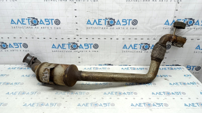 The exhaust pipe with the catalytic converter of the Ford Mustang mk6 18-23 2.3T is rusty, the mesh is torn.