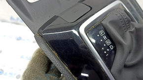 Nissan Rogue 19-20 black shifter cover, under the parking button, scratches