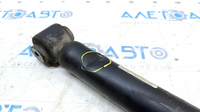 The rear right shock absorber of the Hyundai Elantra AD 19-20 is dented.