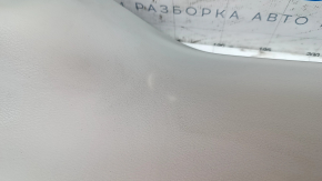 The lower trim of the Nissan Leaf 18-24 trunk door is gray, the plastic has turned white.