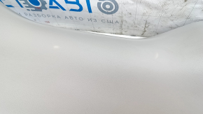 The lower trim of the Nissan Leaf 18-24 trunk door is gray, the plastic has turned white.