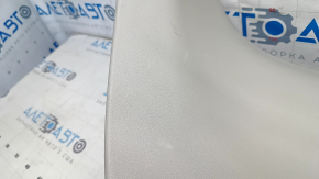 The lower trim of the Nissan Leaf 18-24 trunk door is gray, the plastic has turned white.