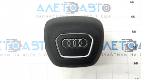 The Audi Q3 83A 19-25 steering wheel airbag, black, scratches