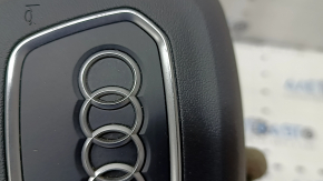 The Audi Q3 83A 19-25 steering wheel airbag, black, scratches