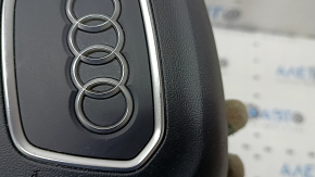 The Audi Q3 83A 19-25 steering wheel airbag, black, scratches