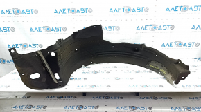 The front right fender liner of a 2016-2017 Honda Accord hybrid is torn.