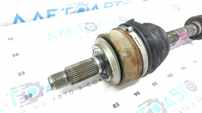 The front left half-shaft of a Honda Accord 16-17 restyling hybrid has a torn outer CV joint boot.