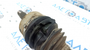 The front left half-shaft of a Honda Accord 16-17 restyling hybrid has a torn outer CV joint boot.